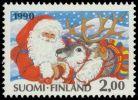 Suomi 1990 - Joulupostimerkki 1990 2/2 - 2,00 mk Joulupukki ja poro Suomi 1990 - Joulupostimerkki 1990 2/2 - 2,00 mk Joulupukki ja poro