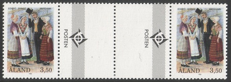 Kansallispukuja 3,50 Eckerö, Brändö ja Mariehamn välilöpari + logo (esimerkkikuva)