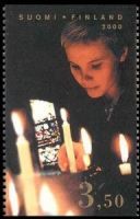 Riemuvuosi 2/4 Nainen ja kynttilät (esimerkkikuva)