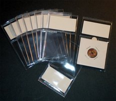 Muovitasku 50 x 50 mm + etiketti esim kolikkokehykselle 10 kpl