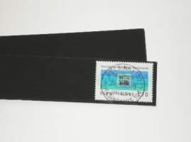 210 x 36 Strip style stamp mounts, black background